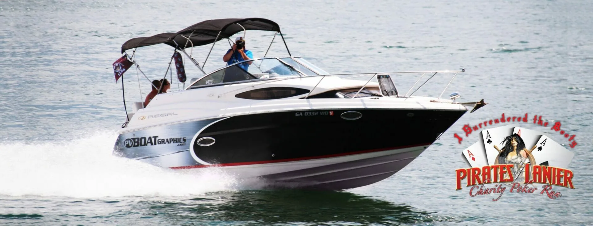 Regal boat on water with PV Boat Graphics