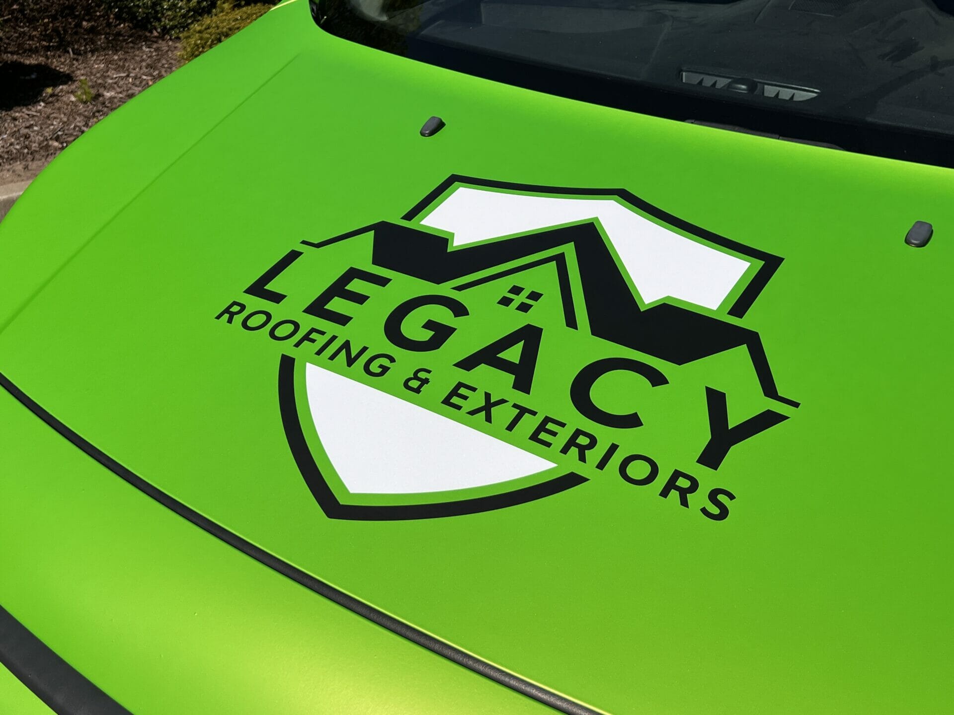 Legacy Roofing hood logo