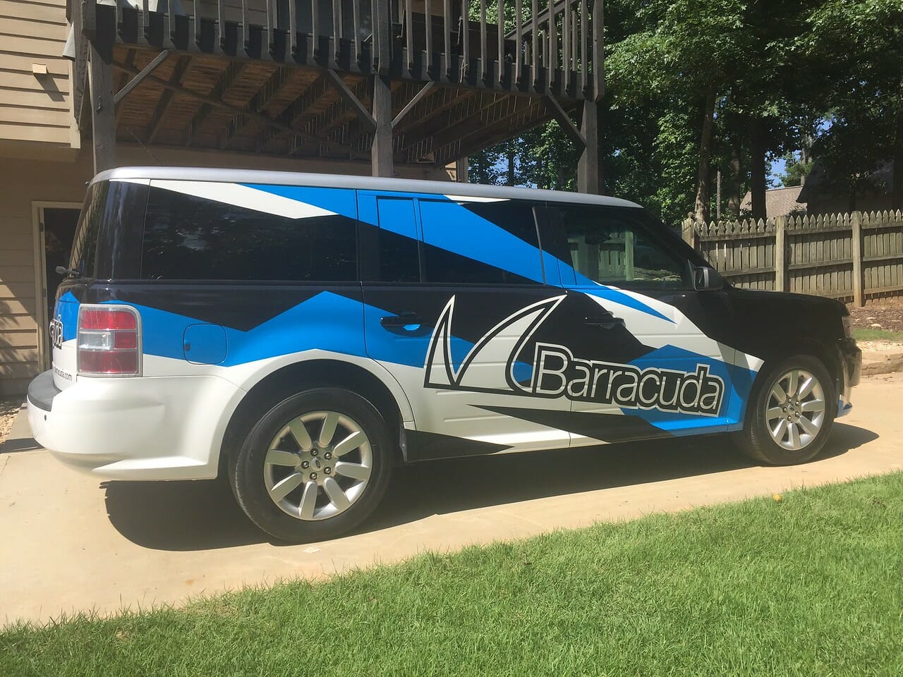 Blue and white Barracuda Ford Flex